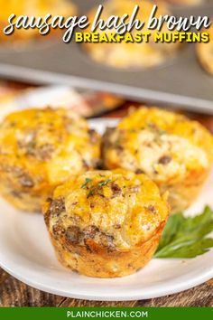 sausage and egg brown breakfast muffins on a white plate with green garnish