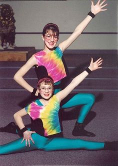 two young children are posing for a photo