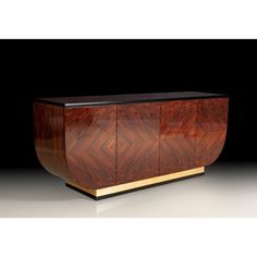 an art deco sideboard in wood and brass