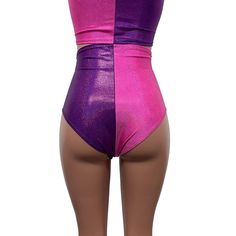 The perfect rave outfit that includes our high-waisted hot pants and crop tank in purple and pink sparkle spandex. Fitted Disco Shorts For Club, Disco Club Shorts Fitted Style, Disco Style Fitted Shorts For Club, Disco Style Fitted Club Shorts, High Waist Rave Bottoms For Club, Fitted Purple Bottoms For Club, Pink Dancewear Bottoms For Dance, Stretch Purple Club Bottoms, Stretch Purple Bottoms For Club