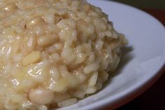 a white plate topped with macaroni and cheese