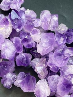 some very pretty purple crystals on a table