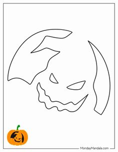 a halloween pumpkin with an evil face cut out in the center and a jack o lantern on