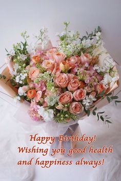 a bouquet of flowers with the words happy birthday wishing you good health and happiness always