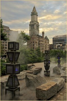 there are many electronic devices in the middle of this park with steam rising from them