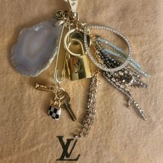 Louis Vuitton Lock And Key #320 Good Condition Place On Any Of Your Luxe Handbags Lock And Key #320 12 Charms And Lock W/Key 14 Large Nature Gray Druzy Stone Large Tear Drop Rhinestone Mini Purse Mini Sparkle Tube Mini Love & Faith Blue Multicolor Tassel Remix New Keychain/Charms For Any Of Your Luxe Lv Handbags Of Key Fobs. Mix And Match With Your Handbag Collection. Please See Photos And Video To Assure Your Purchase. Any Questions? Keychain Collection, Luxe Handbags, Keychain Charms, Mini Love, Handbag Collection, Locks & Key, Lv Handbags, Lock And Key, Mini Purse