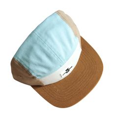 a baseball cap with a blue and brown visor