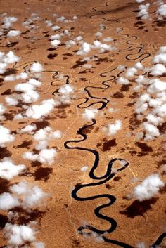 the sky is filled with clouds and some writing on the ground that says, you can't see it