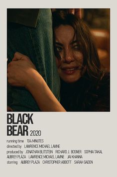 a poster with the words black bear on it and a woman's face peeking out from behind