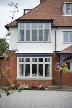 A detached traditional house with flush sash windows in grey Kitchen Window Ideas, Front Window Design, Modern Kitchen Window