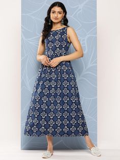 Our navy blue floral print fit and flare sleeveless cotton dress features a boat-neckline with a stylish keyhole detailing at the back, a flared hemline, and roomy pockets. This comfortable style is perfect for elevated everyday wear. Maxi Dress Indian, Kurtis For Women, Indian Anarkali, Summer Dress For Women, Sleeveless Cotton Dress, Maxi Dress For Women, Kurta Dress, Influencers Fashion, Maxi Dress Cotton