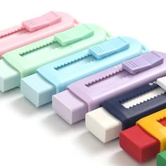 several different colored toothbrushes lined up together