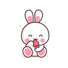 a cute little bunny eating a strawberry