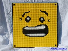 a close up of a lego smiley face