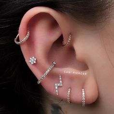 a woman with ear piercings on her ears