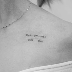 the back of a woman's shoulder with an inscription on it that says love