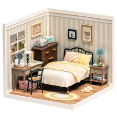 a dollhouse bedroom with a bed, desk and chair