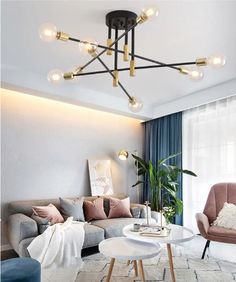 a living room filled with furniture and lights