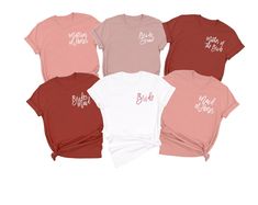 five different colored shirts with the words bride and maid in white, pink, red, and blue