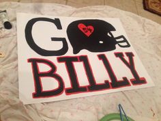 there is a sign that says go billy with an elephant in the middle and hearts on it