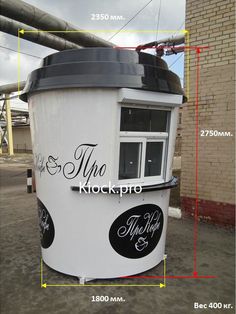 a white and black ice cream stand with measurements