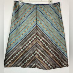 Beautiful Textured Tapestry Like Fabric In Luscious Seafoam Green, Maize Gold, Chocolate Brown, And Stripe Of Bright Sapphire Blue. Style As Cowgirl, Southwest, Formal, Beautifully Lined. Will Go Well With Boots! Waist Is 16.5” Hips Flat Approx. 21” Almost, Top To Bottom 24.25”. Wear On Hip For Best Look. Southwest Print Skirt, Textured Tapestry, Southwest Print, Gold Chocolate, Studio Green, Maize, Blue Style, Seafoam Green, Sapphire Blue