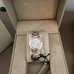 Brand New Authentic Rose Gold Burberry Watch! This Burberry Stainless Steel Women's Watch Will Always Be Recognized For Its Trademark Elegance. The Model Comes With A 26mm Case Diameter To Keep The Face Easy To Read. Give This Piece As A Thoughtful Gift To A Loved One. Timeless Pink Gold Watches With Subdials, Timeless Pink Gold Watch With Diamond Hour Markers, Designer Rose Gold Chronograph Watch, Diamond Watch With Date Display For Gift, Luxury Rose Gold Analog Watches, Luxury Diamond Watch With Date Display, Elegant Pink Gold Watch For Gift, Elegant Pink Gold Watch As Gift, Timeless Rose Gold Chronograph Jewelry