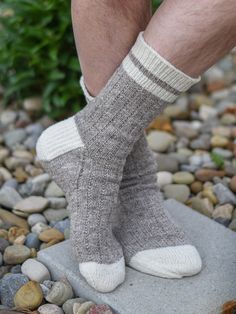 This top-down sock in five sizes (XS/S/M/L/XL) is one step away from a basic plain vanilla construction and universally appealing for men, women, and kids of all ages. Work in two colors to emphasize its vintage vibe or stick with one color for sleek simplicity. Whichever way you decide to work it, this project travels well and is an excellent choice for beginning sock knitters. This pattern calls for sport weight yarn, but may be worked in fingering yarn on smaller needles, using instructions f Men Socks Pattern, Socks Diy, Work Socks, Sock Knitting, Needle Crafts, Watch Cap, Sock Knitting Patterns, Knitted Socks, Sport Weight Yarn