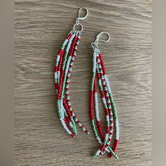 Handmade Christmas Shoulder Dusters In Red, Green And Pearlilized White Seed Beads Approximately 5.75” Sterling Silver Lever Back Ear Wires Silver Plated Findings Red, Metallic Green And Pearly White Seed Beads Handcrafted By Me Gift Boxed, Ready To Wrap I Always Ship Same Day Or Next Business Day Custom Orders Are Always Welcome Any Questions Please Feel Free To Ask! Save $$ Bundles Of 2 Or More Items Automatically Receive A 20% Discount! Please Check Out @Smadden424 For Many More Jewelry Choic Tassel Beaded Earrings, Beaded Holiday Earrings, Beaded Thanksgiving Earrings, Christmas Seed Bead Earrings Patterns, Beaded Winter Earrings, Beaded Christmas Earrings Diy, Christmas Fringe Earrings, Christmas Earrings Beaded, Fall Seed Bead Earrings