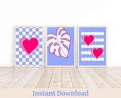 three framed art prints with hearts and checkered squares in blue, pink, and red