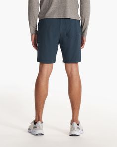 One short for every sport, the Kore Shorts have a classic athletic fit, falling just above the knee with an anywhere and everywhere versatility. Go commando in confidence with the breathable, boxer-brief liner. Also available in 5" and 9" inseam. | Vuori Kore Shorts | Indigo | XXL Vuori makes premium performance apparel inspired by the active Coastal California lifestyle; an integration of fitness, surf, sport, and art. Breaking down the boundaries of traditional activewear, we are a new perspec Recycled Polyester Sports Bottoms, Short Length, Bottoms With Built-in Shorts For Outdoor Activities, Recycled Polyester Sport Shorts, Outdoor Activewear With Built-in Shorts And 4-way Stretch, Compressive Casual Activewear For Outdoor Activities, Casual Compressive Activewear For Outdoor Activities, Sportswear Bottoms With Built-in Shorts In Recycled Polyester, Sporty Nylon Athletic Shorts With Comfort Waistband, Functional Short Leg Activewear For Outdoor