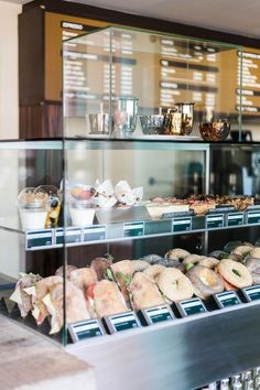 a display case filled with lots of different types of food