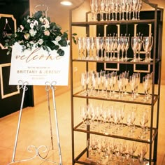 a display case filled with lots of champagne glasses