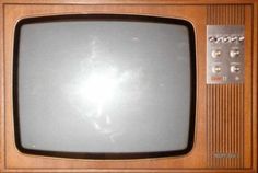 an old fashioned television with no signal on it