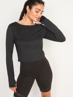 "Online exclusive! Power up your workout with our PowerSoft performance top--lightweight breathability meets a ridiculously smooth, peachy-soft feel.  Scoop neck.  Long raglan sleeves, with thumbhole slits at each sleeve opening.  Stash pocket, with Navy Crop Top, Long Sleeve Workout Top, Patterned Crop Top, Long Sleeve Workout, Black Jack, Cropped Tube Top, Old Navy Women, Black Crop Tops, Cropped Top