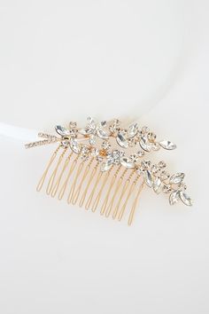 Lulus Exclusive! Add that final, perfect touch to your special day with the Lulus Perfect Finale Gold Rhinestone Barrette! This gorgeous hair comb features gleaming silver rhinestones that form a flower branch-inspired design and sits atop a shiny gold comb. Wear as an accent to your gorgeous updo, or as a perfect touch to a side braid style! Measures 4" long. Brass, Steel, Glass. Imported. Lulus | Perfect Finale Gold Rhinestone Barrette. Silver Rhinestone Headband, Rhinestone Barrette, White Hair Clip, Gold Hair Clips, Bridal Hair Clip, Side Braid, Bridal Belt, Rhinestone Bridal, Flower Branch