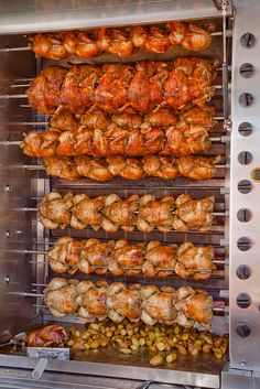 meat is being cooked on the grill in an oven