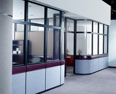 an empty office with several cubicles in it