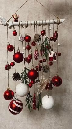 a wind chime with ornaments hanging from it