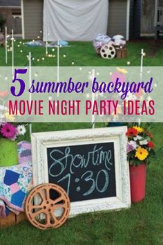 an outdoor movie night party with flowers and decorations