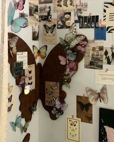 there are many butterflies on the wall