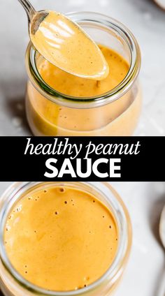 two jars filled with healthy peanut sauce on top of a table next to spoons