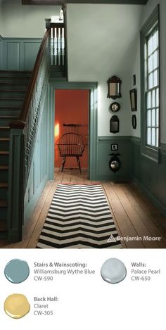 the stairs and railings in this house are painted with different shades of blue, green, and yellow