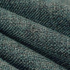 the fabric is green and grey in color