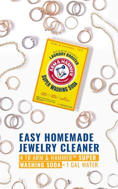 the easy homemade jewelry cleaner is on display in front of a white background with silver rings