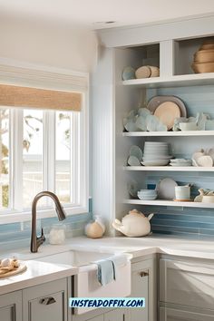 the kitchen is clean and ready to be used for cooking or baking, with dishes on shelves above the sink