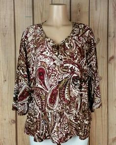 RAFAELLA Women's Size XL 3/4 Sleeve Embellished Stud V-neck Poly Boho Shirt Top   Size: XL  Measurements (laying flat): Bust 23" / Length 25"  Material: Polyester  Color: Multi-colored   #rafaella #clothing #boutiques #style #shop #shopping #whatstrending #women #clothes #ebaystore #store #sale #womensclothes #womensfashion #ontrend #shopmycloset #ebay #fashion #clothesforsale #forsale #fashionista #womenswear #shoponline #fashiontrends #instacloset #instasale #instashop #instastyle #instagood Luxury Women's Paisley Print Tops, Elegant V-neck Blouse With Paisley Print, Bohemian Boho Print V-neck Top, Luxury Multicolor Paisley Print Top, Chic V-neck Paisley Print Tops, Boho Shirts