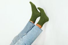 Thermal, moss green ankles are a midweight premium pair of socks featuring a knitted sweater-like design throughout. The thicker knit blend will keep your feet warm and steps soft. Size: + OSFA, W 7-10 Design: + 96 Needle + Mid weight + Reinforced toe & heel + Seamless toe + Sweater knit + Tall ankle Content + Care: + Premium Combed Cotton + Wash Cold/Dry Low + Imported Created by Tailored Union. Trendy Green Fall Socks, Cozy Green Socks For Winter, Green Winter Socks, Stretch Green Socks For Fall, Green Stretch Socks For Fall, Comfortable Green Winter Socks, Comfortable Green Stretch Socks, Comfortable Stretch Green Socks, Casual Green Winter Socks