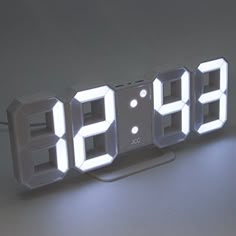 an alarm clock that has been turned on to show the time as eight thirty minutes