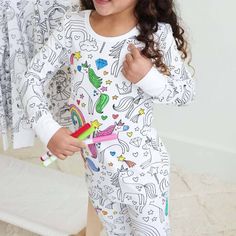 Make your little one's most colorful dreams come to life in these colorable pajamas! Made from our signature bamboo fabric, your kiddos will stay cool and comfortable all while making these PJs creatively their own. Use skin-safe, non-toxic fabric markers to keep your child's sensitive skin protected, all while keeping their masterpiece intact with no color bleeding after washes. Give your kids hours of fun that will not only add some magic into their bedtime routine, but serve as the coziest ke Caden Lane, Vivid Dreams, Men's Totes, Bamboo Pajamas, Baby Bundles, Fabric Markers, Color Care, Bamboo Fabric, Kids Pajamas